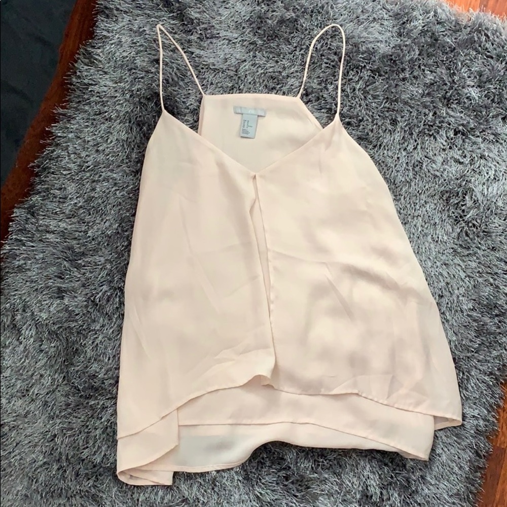 Beige flows top
